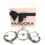 Lot, four Pandora sterling silver bracelets with