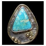 Sterling silver bezel set turquoise ring with