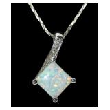 Sterling silver opal pendant with 16" sterling