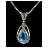 Sterling silver pear cut blue topaz pendant with