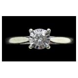 10K White gold diamond solitaire ring in cathedral