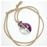 Amethyst and peridot pendant on 24" silk cord