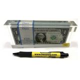 Currency paperweight