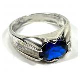 Sterling silver oval cut claw set blue spinel ring