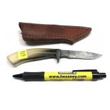 Custom Damascus steel blade knife with embossed