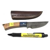 Custom Damascus steel blade knife with embossed