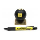 8 Ball Lighter on platform marked "Thought for