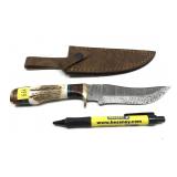 Custom Damascus steel blade knife with embossed