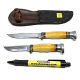 Pair of KaBar hunting knives with leather sheath