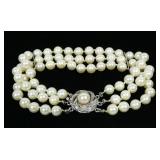 Sterling silver 8" three-strand 6mm pearl bracelet