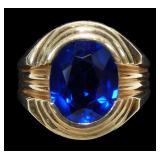 10K Yellow gold oval cut bezel set blue stone