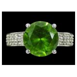 Sterling silver round cut green stone ring with