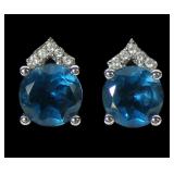 10K White gold blue topaz stud earrings with