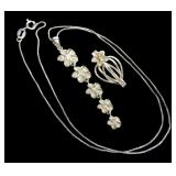 Sterling silver graduated flower pendant with