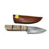 Custom Damascus steel knife with embossed
