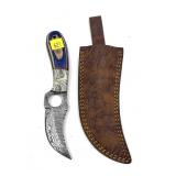 Custom Damascus steel knife with embossed