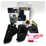 Lot: assorted holsters and frame, includes: