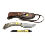Stag handle hunting knife with leather sheath,