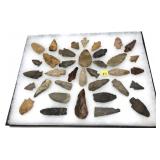 Collection of Native American stone arrow heads,