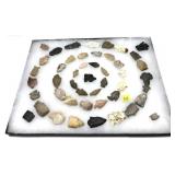 Collection of Native American stone arrow heads,