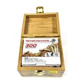 Wooden ammo box of .22 LR. HP Winchester