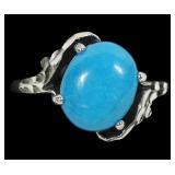 Sterling silver claw set turquoise ring, size 7
