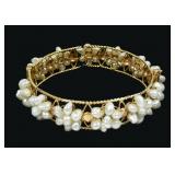 18K Yellow gold and pearls hinged bangle bracelet,