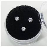 Lot, three round cut loose diamonds,