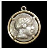 10K Yellow gold bezelled Roman coin pendant