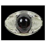 Sterling silver claw set red stone (garnet?) ring,