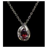 Sterling silver gold wash pear cut garnet pendant