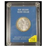 1897-O Morgan dollar, slab certified B.U.