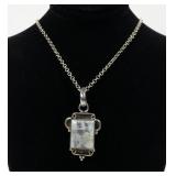 Sterling silver bezel set flourite pendant with