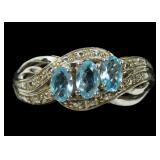 Sterling silver blue oval cut three-stone ring