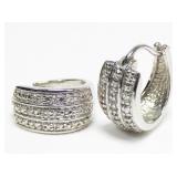 Sterling silver huggie hoop earrings with diamond