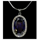 Sterling silver oval cut blue stone and CZ pendant