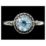Sterling silver round cut bezel set blue topaz