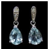Sterling silver post earrings with pear cut blue