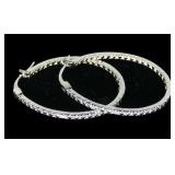 Sterling silver oval hoop earrings with diamond