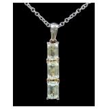 Sterling silver emerald cut topaz three-stone