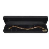 14K Yellow gold 7.5" marquise cut garnet tennis