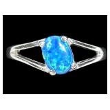Sterling silver prong set lab blue opal ring with