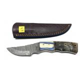 Custom Damascus steel blade knife with embossed