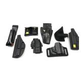 Lot: 8- Assorted Holsters and Mag pouch