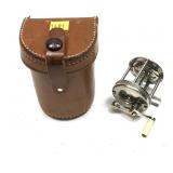 Vintage Peerless reel with leather Redhead reel
