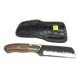 Custom steel blade knife with embossed leather