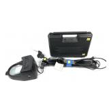 Adjustable magnification lamp and hand gun case