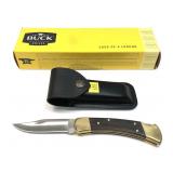 Buck 110 1-blade folding knife in leather sheath