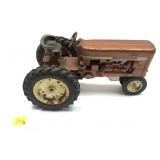 International toy tractor, 8" L x 4" H