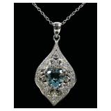 Sterling silver heart shape cut blue topaz and CZ